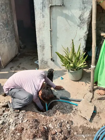 Service pipe being fitted to a water line